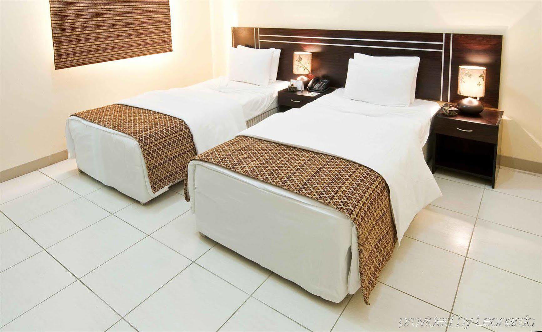 La Villa Hotel Doha Room photo